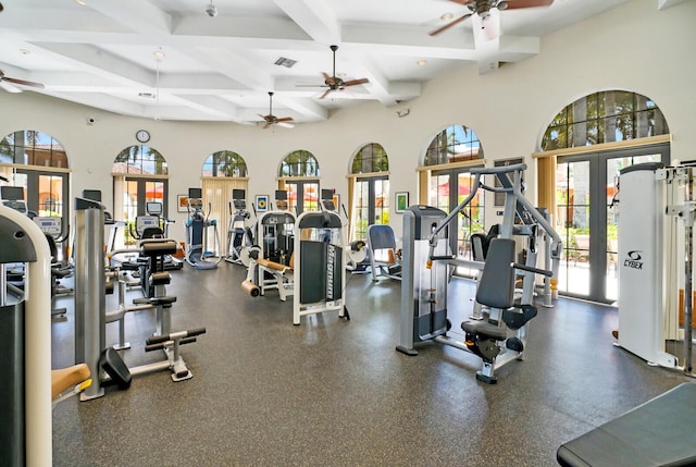 9772 Via Grandezza W, Wellington, FL 33411 - workout area with plenty of natural light, a ceiling fan, and french doors