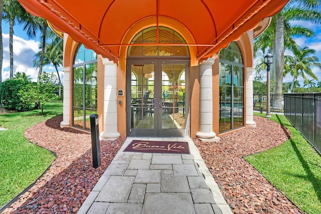 9772 Via Grandezza W, Wellington, FL 33411 - property entrance featuring fence and french doors