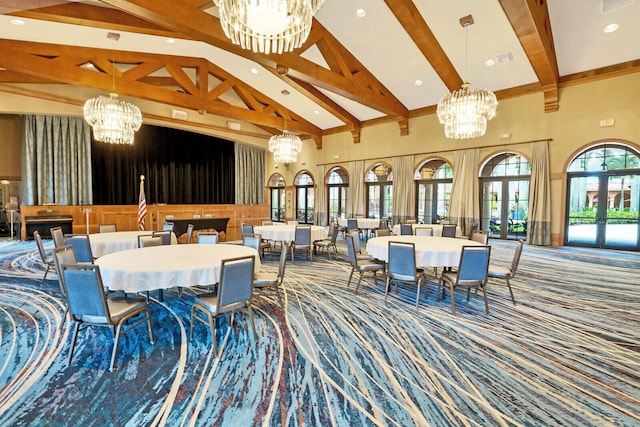 dining area featuring high vaulted ceiling, a chandelier, beamed ceiling, and carpet