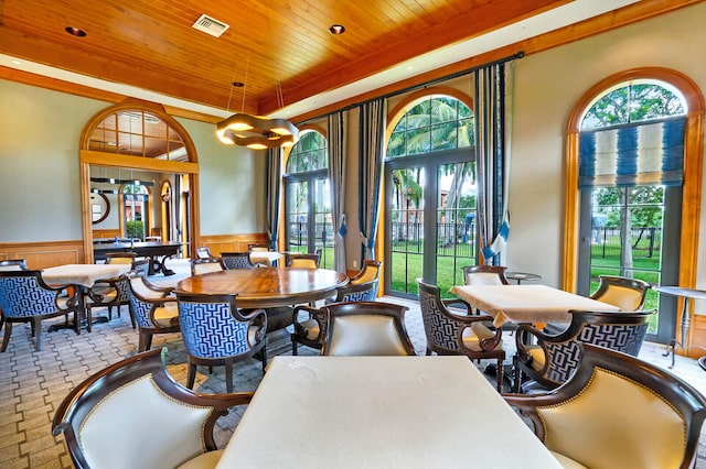 dining room with wooden ceiling and french doors