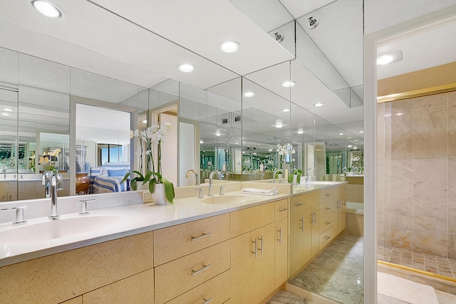 bathroom featuring vanity and a tile shower