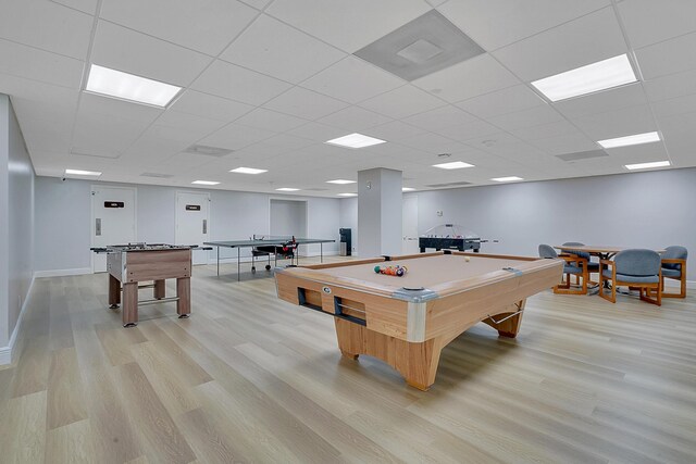 playroom with a paneled ceiling, light hardwood / wood-style floors, and billiards