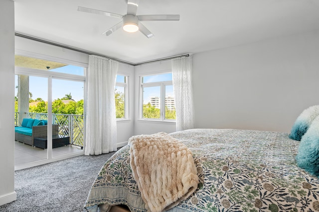 carpeted bedroom with ceiling fan and access to exterior