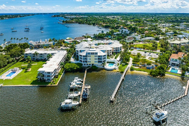 birds eye view of property featuring a water view