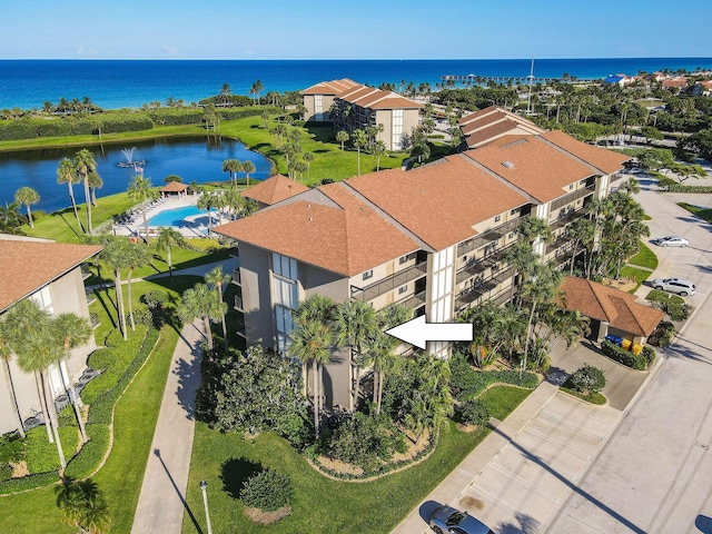 drone / aerial view featuring a water view