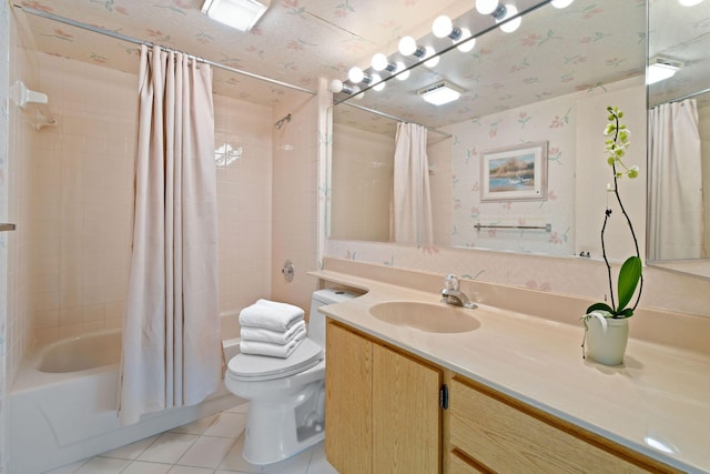 full bathroom with tile patterned floors, toilet, shower / tub combo, and vanity