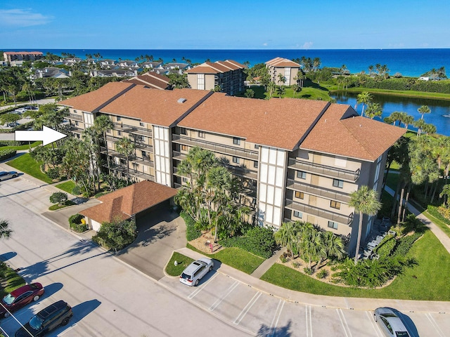 drone / aerial view featuring a water view