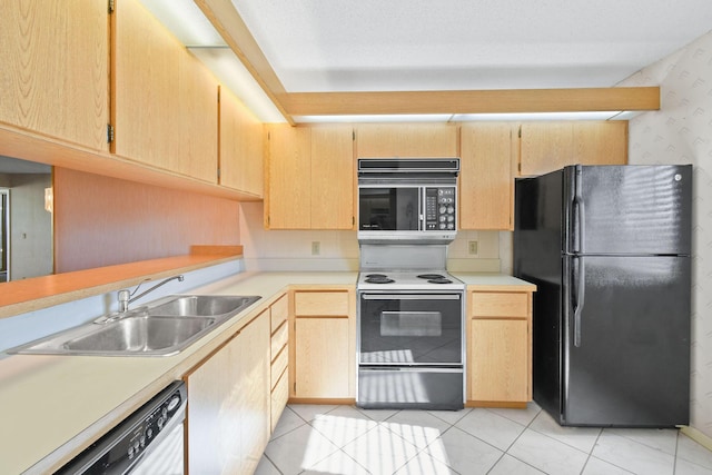 kitchen with sink, light brown cabinets, and black appliances