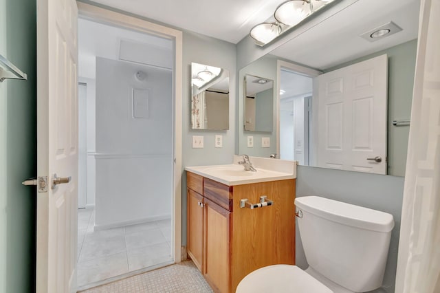 2006 Exeter A, Boca Raton, FL 33434 - bathroom featuring vanity, toilet, and tile patterned flooring