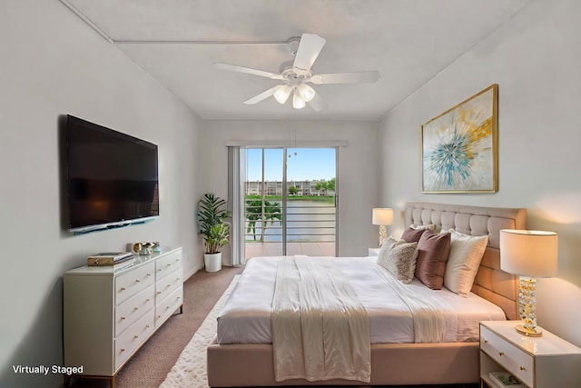 2006 Exeter A, Boca Raton, FL 33434 - carpeted bedroom featuring access to exterior, a ceiling fan, and baseboards