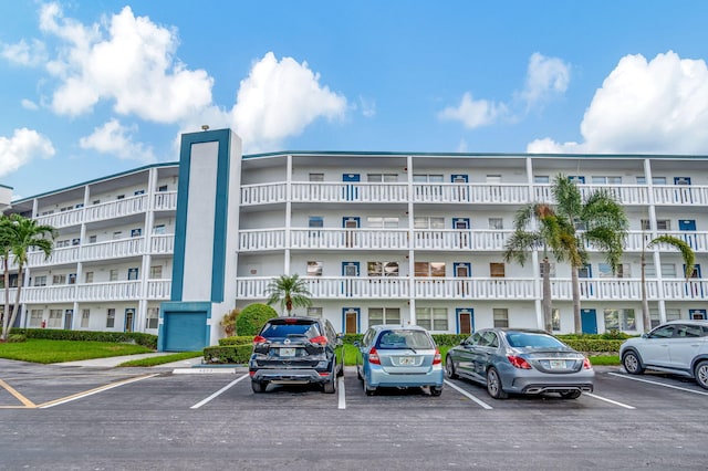 2006 Exeter A, Boca Raton, FL 33434 - view of apartment building / complex featuring uncovered parking