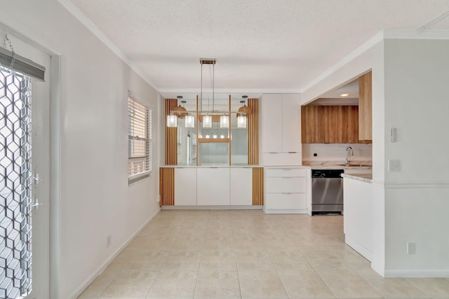 2006 Exeter A, Boca Raton, FL 33434 - kitchen with stainless steel dishwasher, light countertops, ornamental molding, a sink, and light tile patterned floors