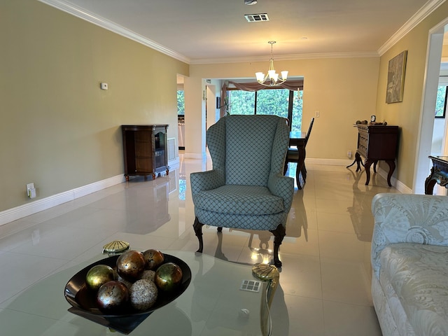 living room featuring ornamental molding, a chandelier, and light tile patterned floors