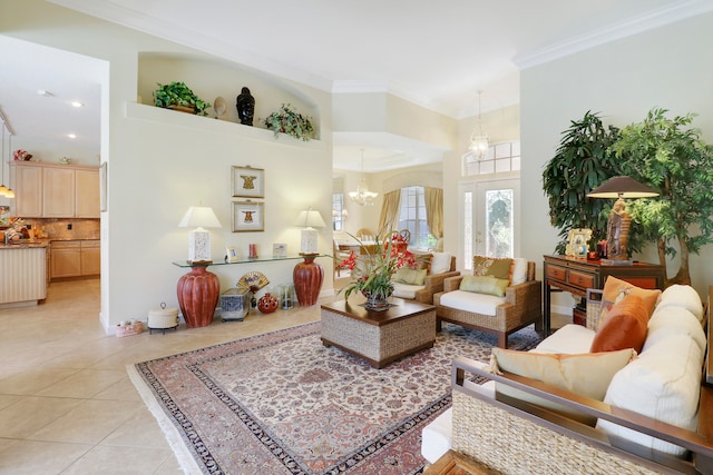 tiled living room with a notable chandelier and ornamental molding