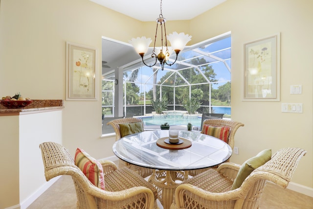 8100 Alister Pl, Port Saint Lucie, FL 34986 - tiled dining space with a sunroom and baseboards