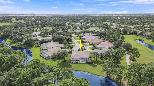 8100 Alister Pl, Port Saint Lucie, FL 34986 - aerial view of property's location with a nearby body of water, nearby suburban area, and a golf club