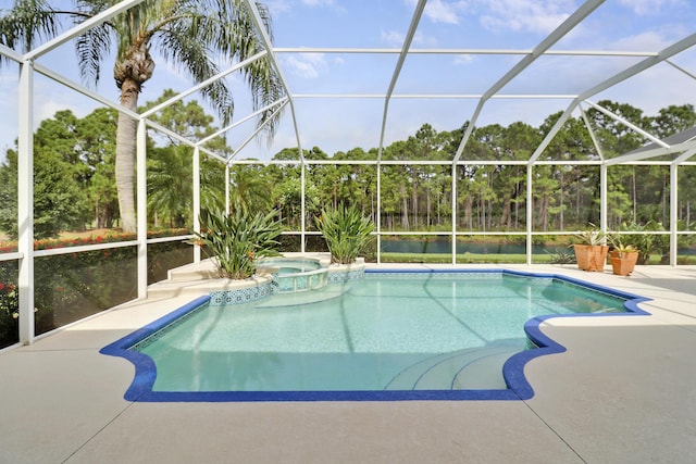 8100 Alister Pl, Port Saint Lucie, FL 34986 - view of pool with a pool with connected hot tub, a patio area, and glass enclosure