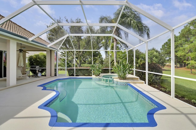 8100 Alister Pl, Port Saint Lucie, FL 34986 - view of pool featuring a patio, a ceiling fan, glass enclosure, and a pool with connected hot tub