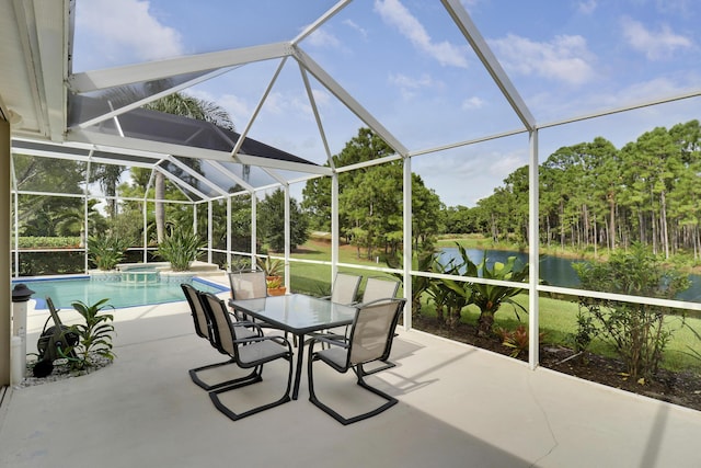 8100 Alister Pl, Port Saint Lucie, FL 34986 - view of patio with a water view, an outdoor pool, glass enclosure, outdoor dining space, and a jacuzzi
