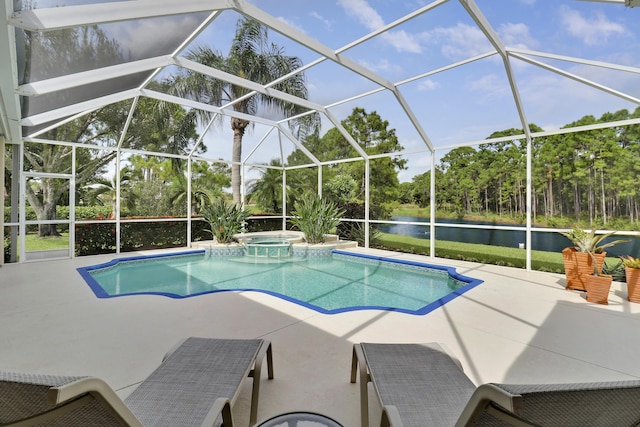 8100 Alister Pl, Port Saint Lucie, FL 34986 - view of swimming pool with a water view, a patio, a pool with connected hot tub, and view of wooded area