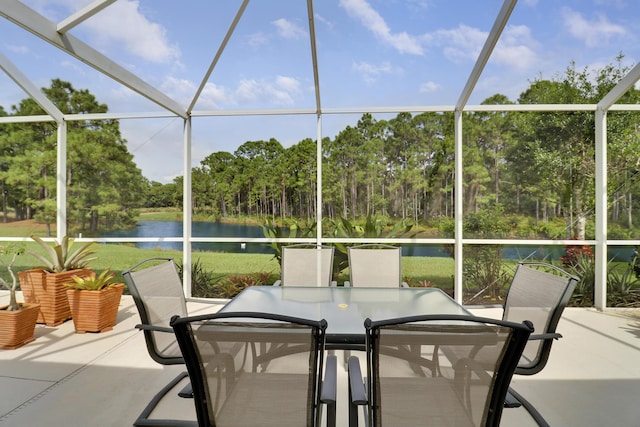8100 Alister Pl, Port Saint Lucie, FL 34986 - sunroom / solarium featuring a water view, outdoor dining space, plenty of natural light, and view of scattered trees