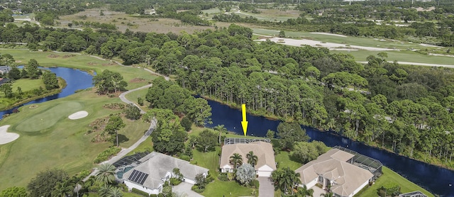 8100 Alister Pl, Port Saint Lucie, FL 34986 - bird's eye view of a nearby body of water, a local golf course, and a tree filled landscape