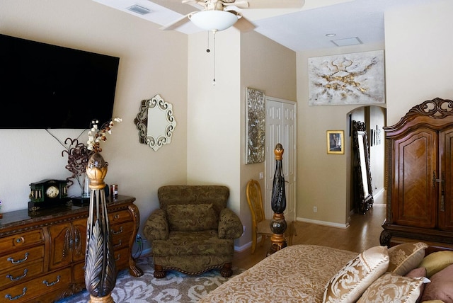 bathroom with a high ceiling, tile patterned floors, and a healthy amount of sunlight