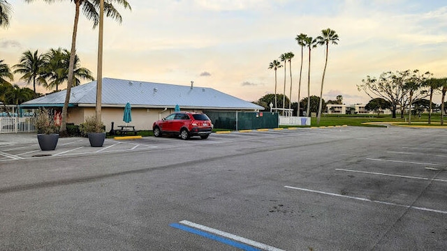 view of parking at dusk