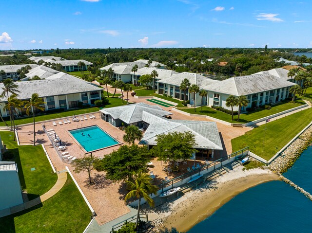 birds eye view of property featuring a water view