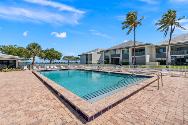 view of swimming pool featuring a patio area