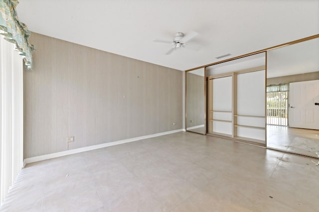 spare room featuring ceiling fan