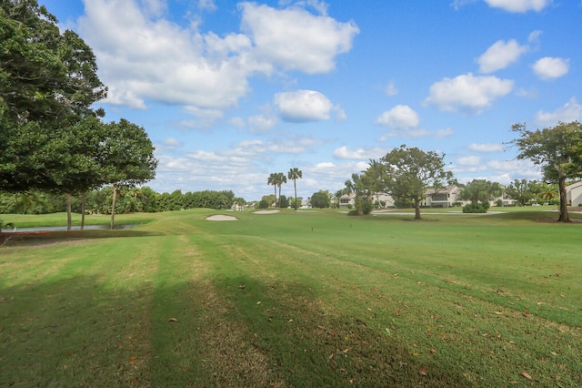 surrounding community with a lawn