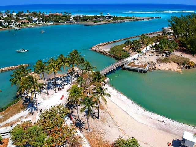 bird's eye view with a beach view and a water view