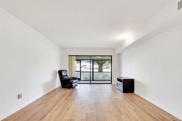 unfurnished room featuring light hardwood / wood-style flooring