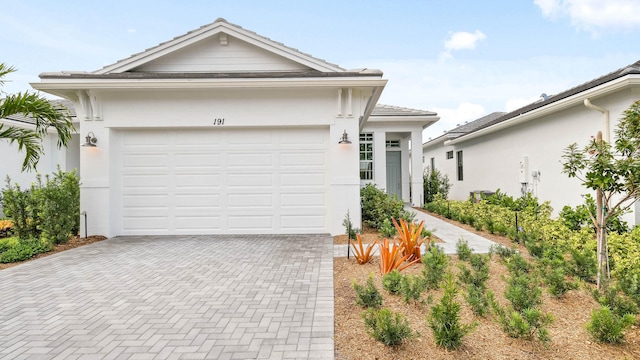 single story home with a garage