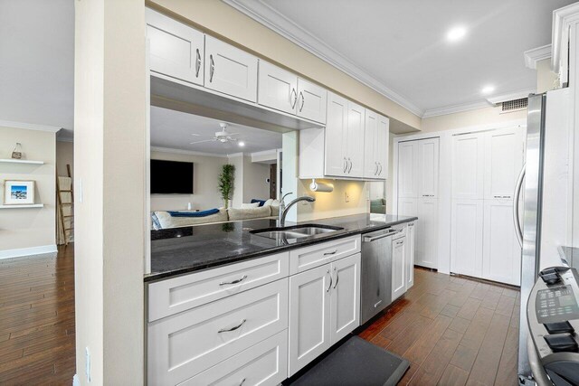 kitchen with white cabinetry, dishwasher, sink, and dark hardwood / wood-style flooring