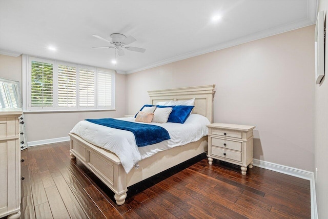 bedroom with ceiling fan, dark hardwood / wood-style floors, and crown molding