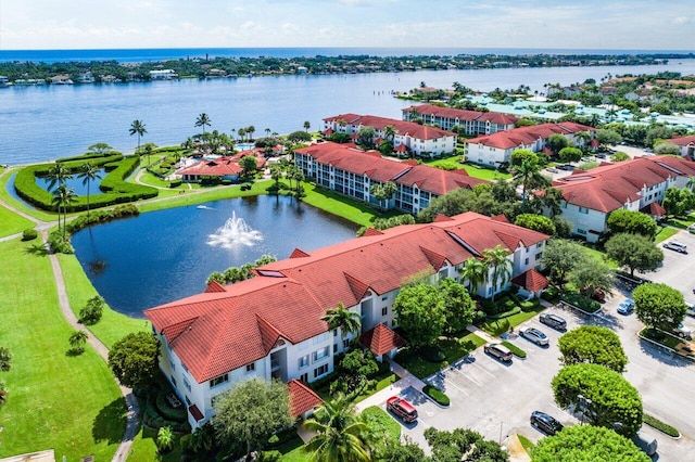 drone / aerial view featuring a water view