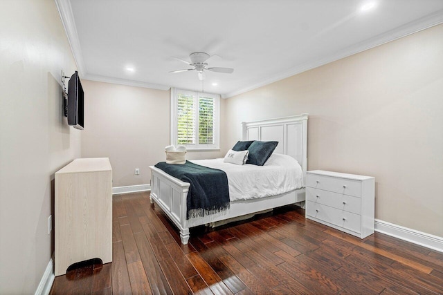 bedroom with ornamental molding, ceiling fan, and dark hardwood / wood-style flooring