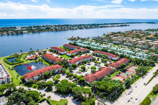 drone / aerial view featuring a water view