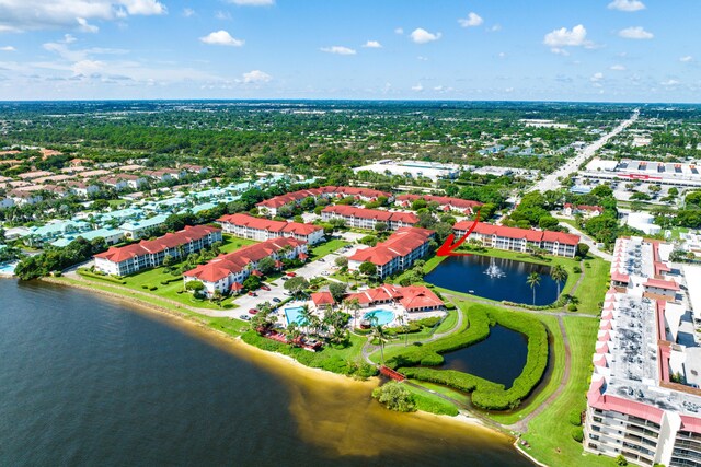 drone / aerial view with a water view