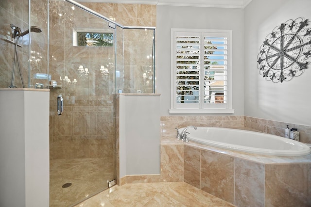 bathroom featuring shower with separate bathtub, ornamental molding, and a healthy amount of sunlight