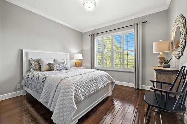 bedroom featuring crown molding and dark hardwood / wood-style flooring