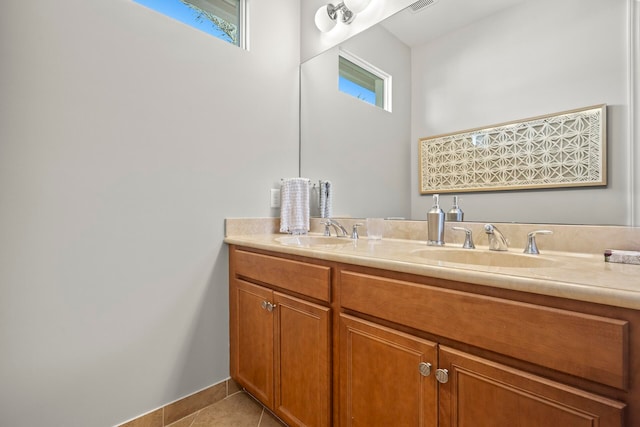 bathroom with vanity and tile patterned flooring