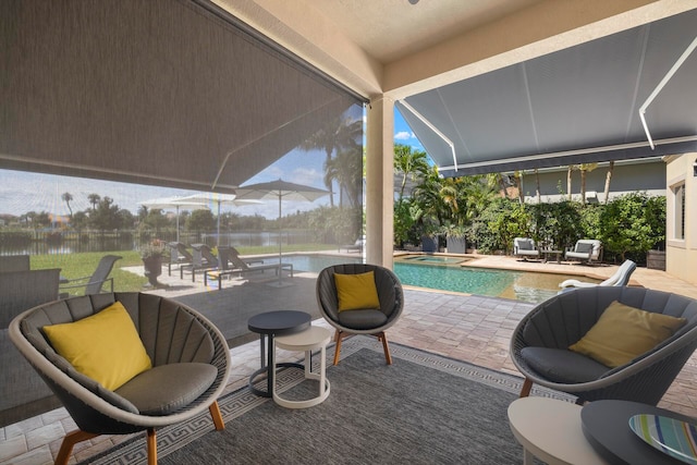 view of patio with a fenced in pool