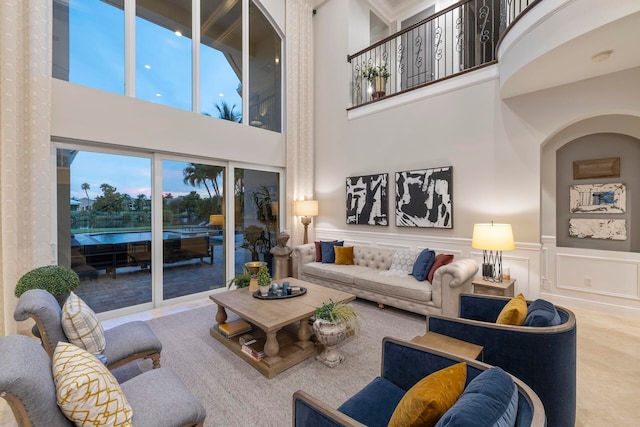 living room with a high ceiling