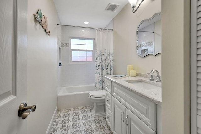 full bathroom with shower / tub combo with curtain, vanity, and toilet