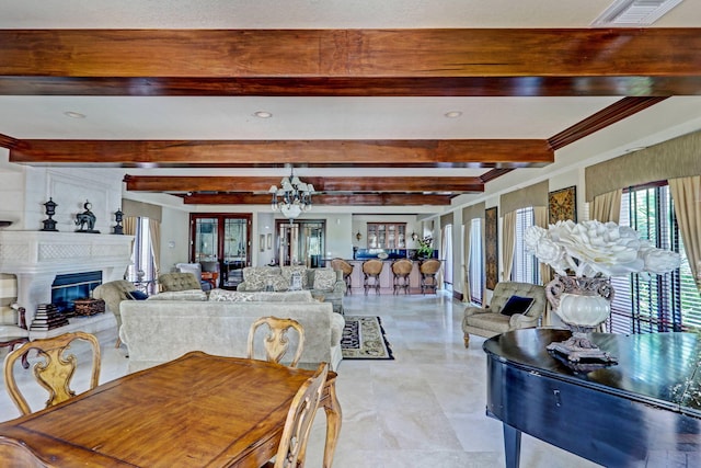 dining room featuring a chandelier, beamed ceiling, and crown molding