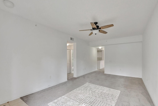 unfurnished room featuring ceiling fan