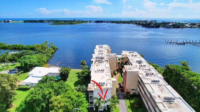 birds eye view of property featuring a water view